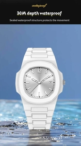 White sports watch detail showing 30M waterproof rating and octagonal bezel