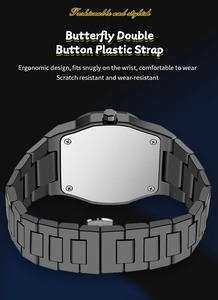 Detail view of black matte plastic watch strap with a secure butterfly double button clasp