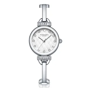 Montre jonc à quartz argentée pour femme avec accents de diamants roses et cadran blanc