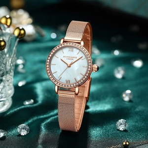 Montre à Quartz Femme Luxe Cadran en Nacre Lunette Strass Étanche Bracelet en Cuir et Maille d'Acier Inoxydable