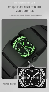 Détail du cadran d'une montre à quartz futuriste avec index et aiguilles luminescents