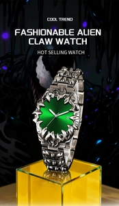Detail of alien claw watch with green sunray dial and silver carved metal bezel