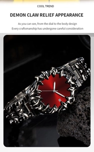 Detail view of red sunray dial watch featuring silver metal claw bezel on dark rock