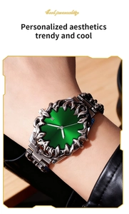 Detailed view of evil eye mens watch featuring a green sunray dial and claw bezel design