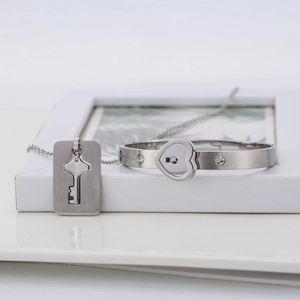 Polished silver couple jewelry set with key pendant necklace and heart lock bracelet