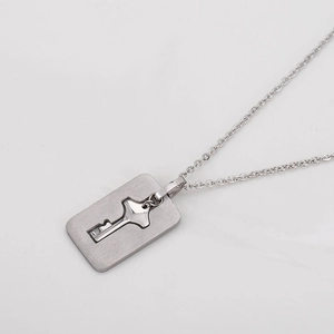 Brushed silver stainless steel necklace featuring a rectangular key pendant and O-chain