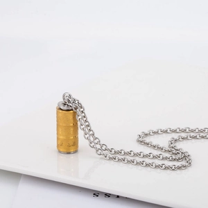 Golden rotating cylinder buddhist necklace with engraved scriptures on stainless steel chain