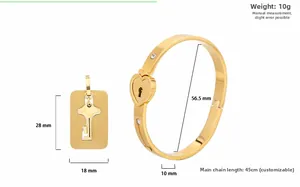 Detailweergave van 18K vergulde hartslot armband en sleutel hanger met afmetingen