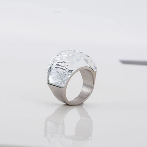 Punk style stainless steel ring featuring a large faceted translucent glass crystal dome