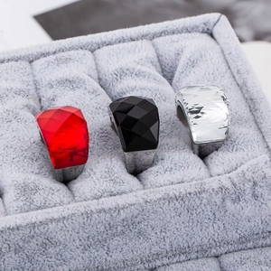 Punk style wide stainless steel ring set with large faceted red black and white glass stones