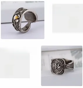Detail of vintage silver ring with floral relief and polished industrial punk design