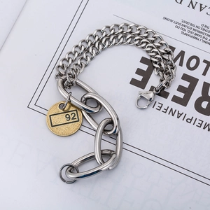 Bracelet chaîne cubaine industrielle avec maillons argentés et pendentif rond doré