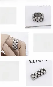 Detailed macro view of 316L stainless steel watch band ring with polished links