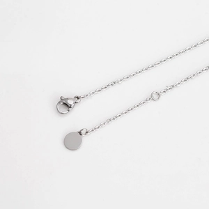 Minimalist adjustable stainless steel cross bracelet with lobster clasp and extension chain