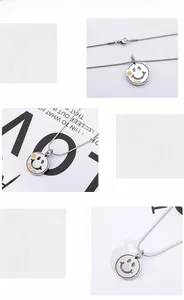 Detailed views of smiley face pendant in 316 titanium steel with Love Life engraving