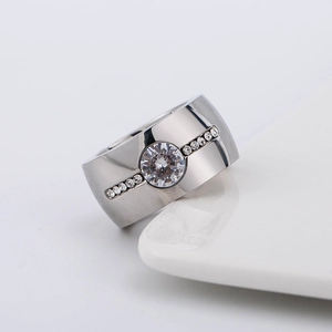 Men's titanium steel ring with 18K gold plating and sparkling round diamond accents