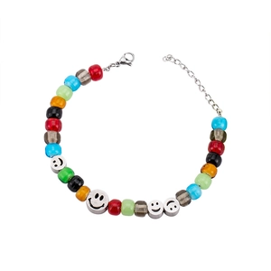 Bracciale di perline di vetro colorate con sorrisi in acciaio al titanio e chiusura