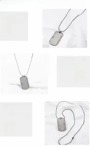 Detail view of vintage 316 titanium steel army tag pendant with engraved numbers on ball chain