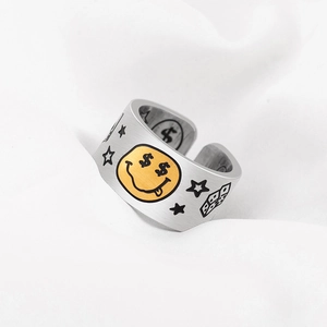 Brushed silver metal coin ring with yellow smiley face and graffiti street style