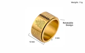 Detail of 12mm wide rotating gold titanium steel ring with Buddhist scriptures