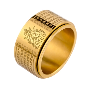 Gold rotating stainless steel band ring with engraved Heart Sutra and Buddha motifs