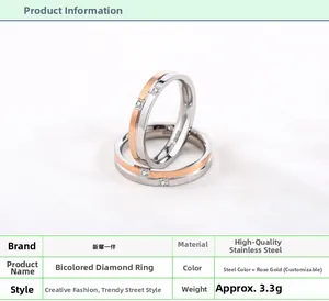 Macro shot of two-tone stainless steel couple rings with rose gold accents and small diamonds
