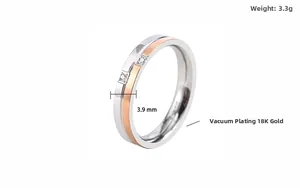 Detail view of 3.9mm wide two-tone titanium steel ring with rose gold matte finish and stones
