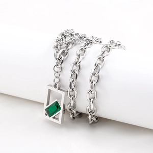 Double-layered silver stainless steel necklace with emerald green rectangular crystal pendant