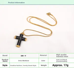 Macro detail of gold and black cross necklace with crystals and stainless steel snake chain