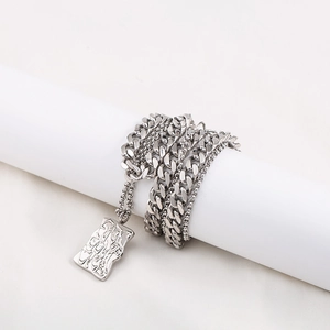 Double-layered silver titanium steel Cuban chain necklace with geometric lava texture pendant
