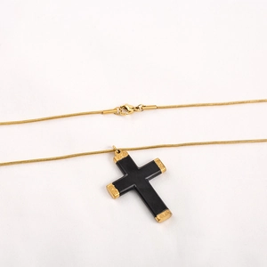 Hip hop black cross pendant with gold-plated details on gold snake chain necklace