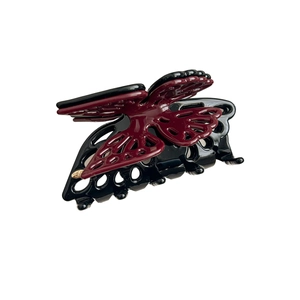 Elegant butterfly hair claw clip with black and burgundy wings in a glossy acetate finish