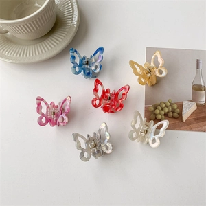 Elegant butterfly hair clips set in 6 assorted marble colors with premium acetate finish