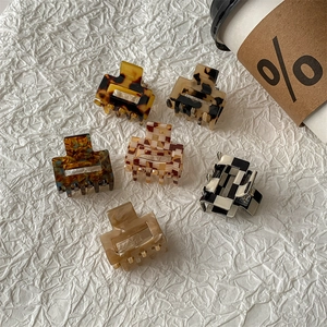 Set of 6 square acetate hair claws featuring leopard print and checkerboard patterns