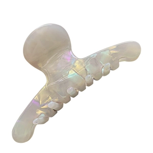 Elegant large pearlescent white acetate hair claw clip with iridescent finish and metal spring