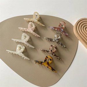 French vintage acetate hair claws in various mermaid colors and marble patterns