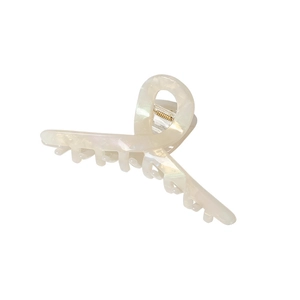 Elegant cream white marble pattern acetate hair claw clip with a stylish cross-ribbon design