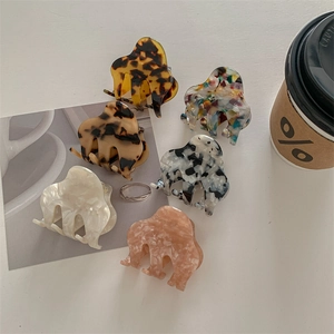 Set of 6 minimalist acetate claw clips in leopard, marble, and mosaic patterns