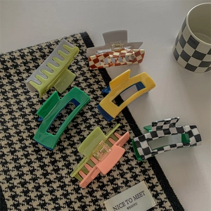 Set of 6 colorful acetate hair claws with retro patterns and glossy checkered design