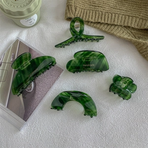 French chic green marble hair claws set in various shapes for elegant updos
