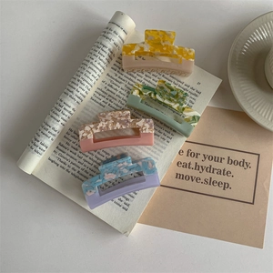 Set of four Morandi marble texture acetate hair claws for elegant women hair styling