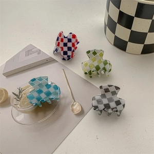 Mini checkered acetate hair claws in red, green, blue and black for a French chic look
