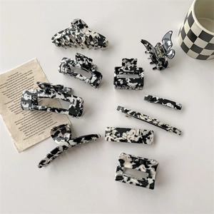 Ensemble de pinces à cheveux et barrettes en acétate marbré noir et blanc minimaliste