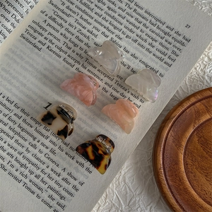 Set of six mini acetate butterfly hair claws in colorful marble and tortoiseshell patterns