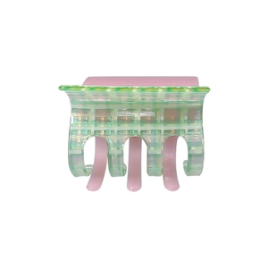 Pink and green checkered acetate hair claw clip with a glossy two-tone finish for women