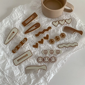 Chic 13-piece hair clip set in cream and mocha colors displayed on a clean background