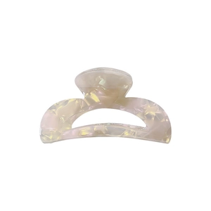 Elegant marble acetate hair claw clip in pastel pink and white with a retro French style