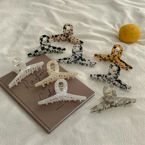 French vintage acetic acid hair claw clips set in various marble and tortoiseshell patterns