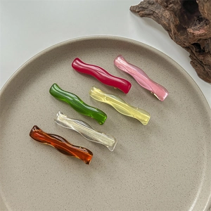 Set of 6 colorful wavy resin hair clips in various bright shades for women