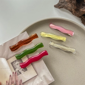 Set of colorful wavy transparent resin hair clips in five vibrant candy colors for summer